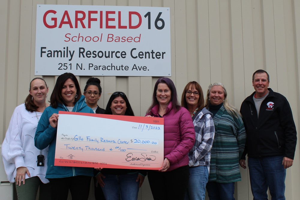 Aspen Community Foundation members presenting check to Garfield 16 School-Based Family Resource Center