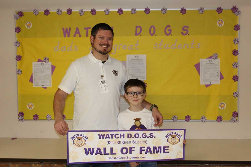 BUE Watch DOGS dad Officer William Van Teylingen  with his son Aidan during the WATCH DOGS Wall of Fame presentation